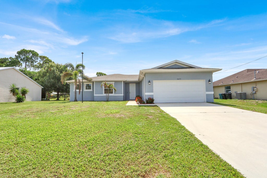 Photo of 3673 SW Bonwold Street, Port Saint Lucie, FL 34953 (MLS # B26058196)