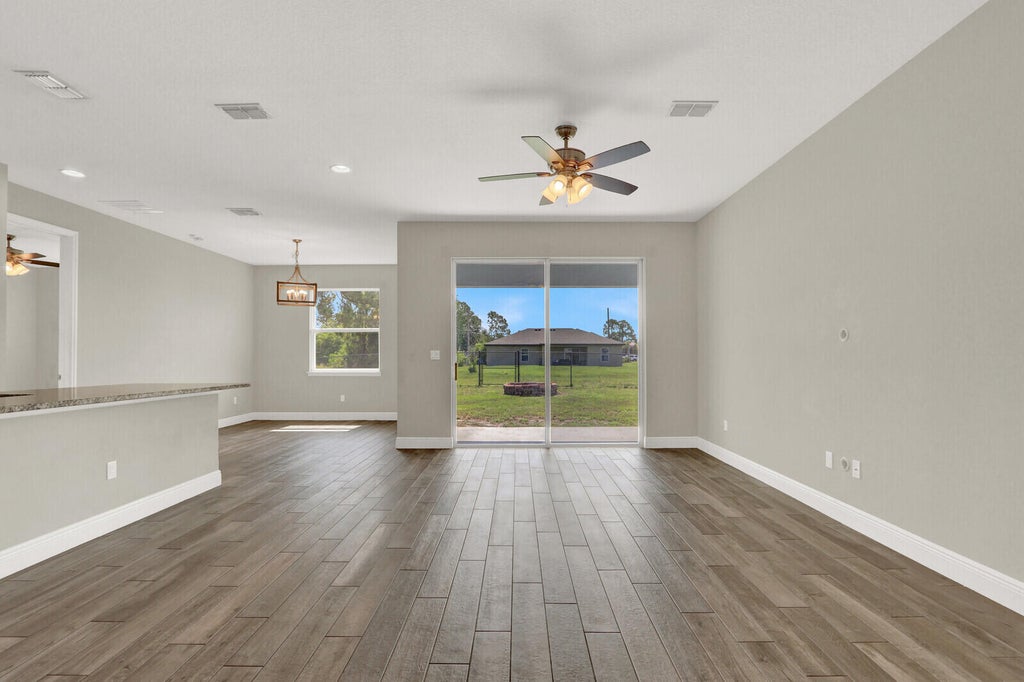 Photo of 3673 SW Bonwold Street, Port Saint Lucie, FL 34953 (MLS # B26058196)