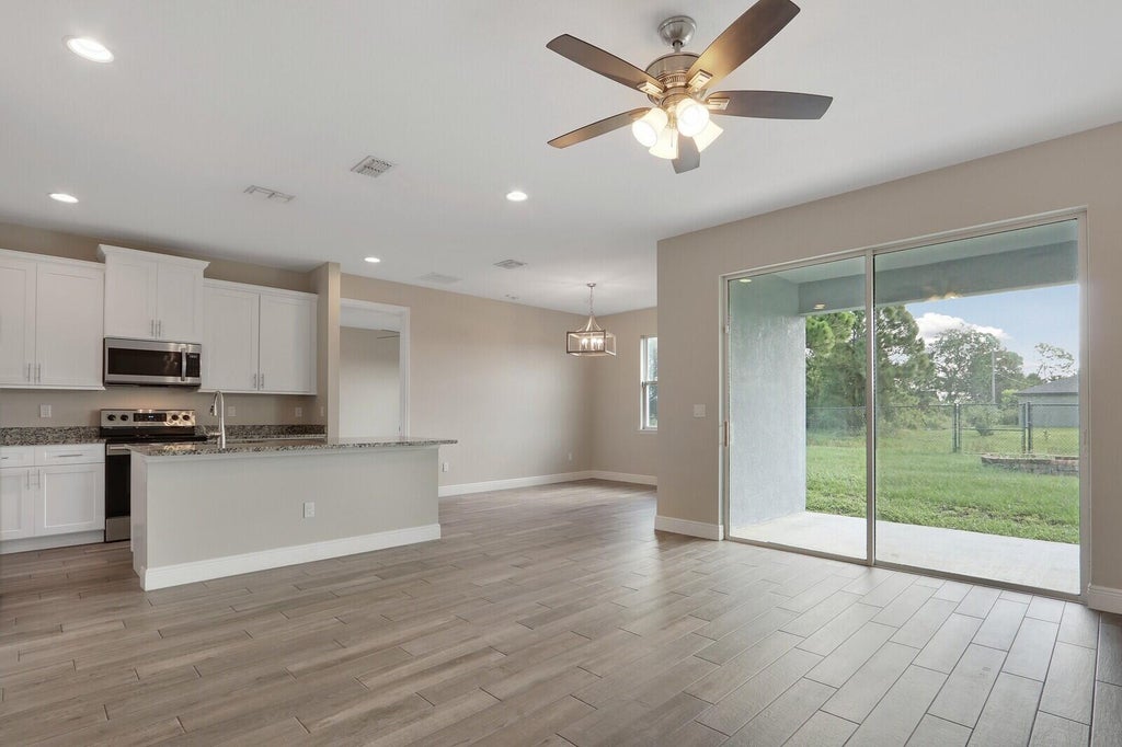 Photo of 3673 SW Bonwold Street, Port Saint Lucie, FL 34953 (MLS # B26058196)