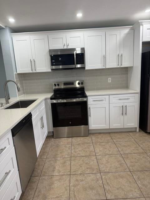 Photo of 701 Palm Beach Trace Drive, Royal Palm Beach, FL 33411 (MLS # B26072753)