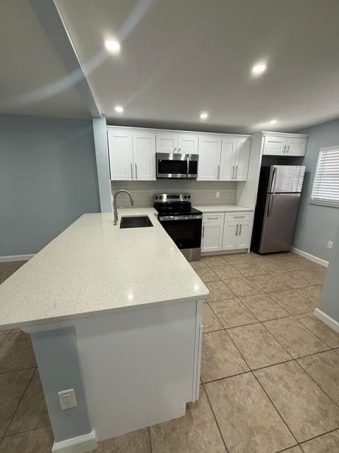 Photo of 701 Palm Beach Trace Drive, Royal Palm Beach, FL 33411 (MLS # B26072753)