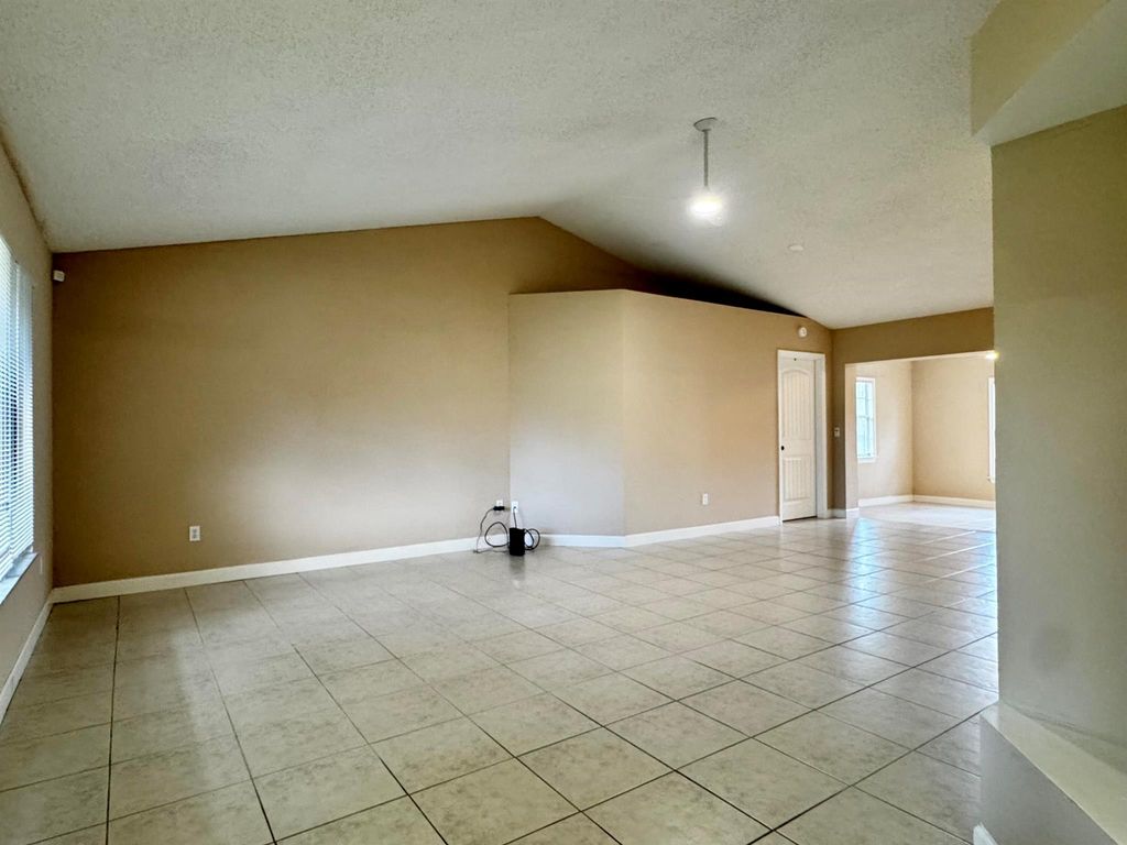 Photo of 610 SE Forgal Street, Port Saint Lucie, FL 34983 (MLS # R11101872)