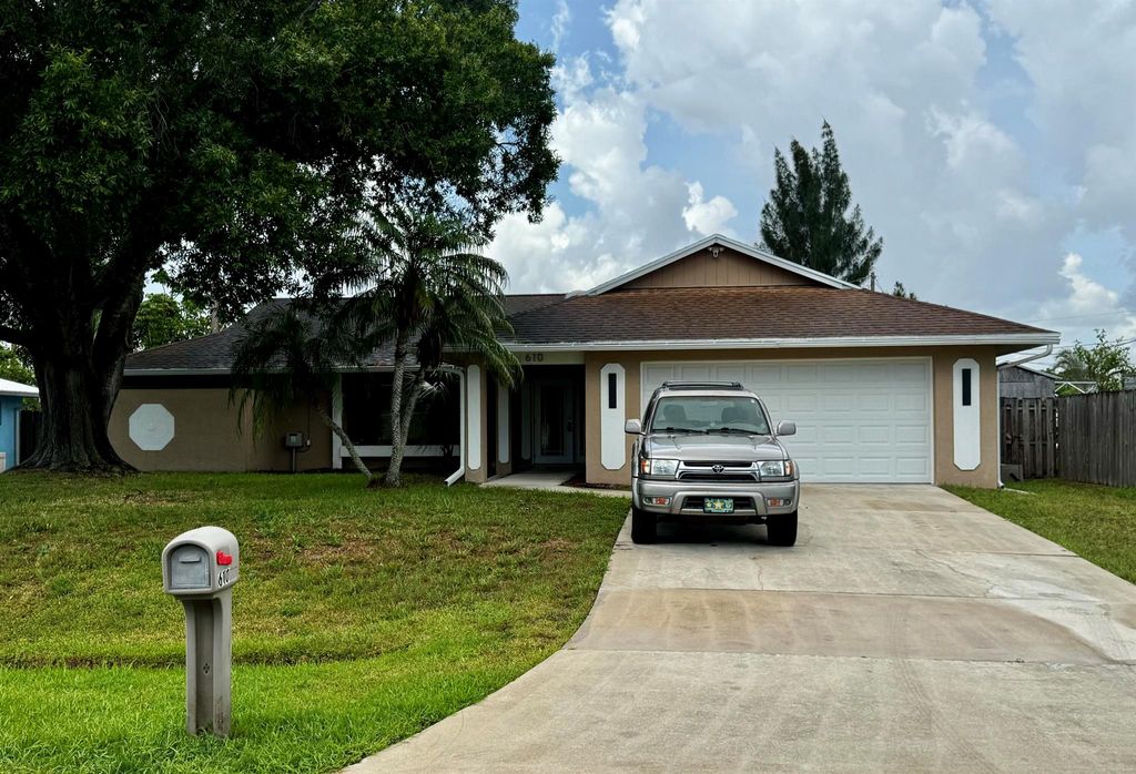 Photo of 610 SE Forgal Street, Port Saint Lucie, FL 34983 (MLS # R11101872)