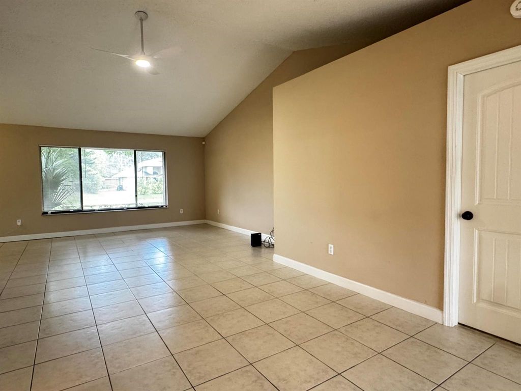Photo of 610 SE Forgal Street, Port Saint Lucie, FL 34983 (MLS # R11101872)