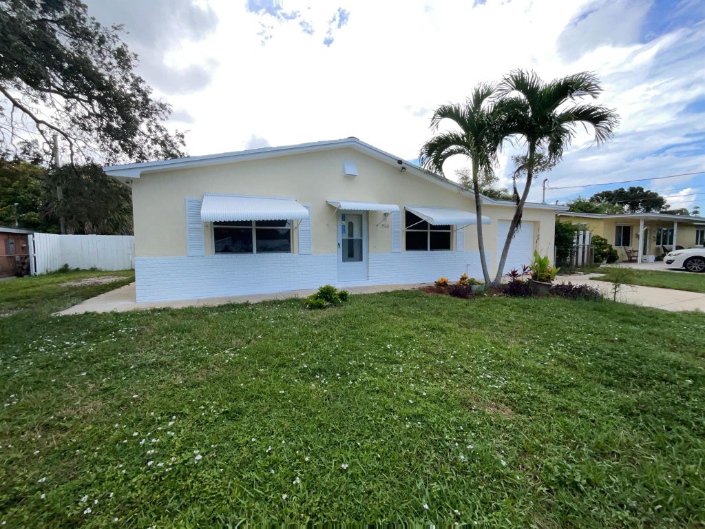 Photo of 1568 NE Sottong Road, Jensen Beach, FL 34957 (MLS # R10910463)