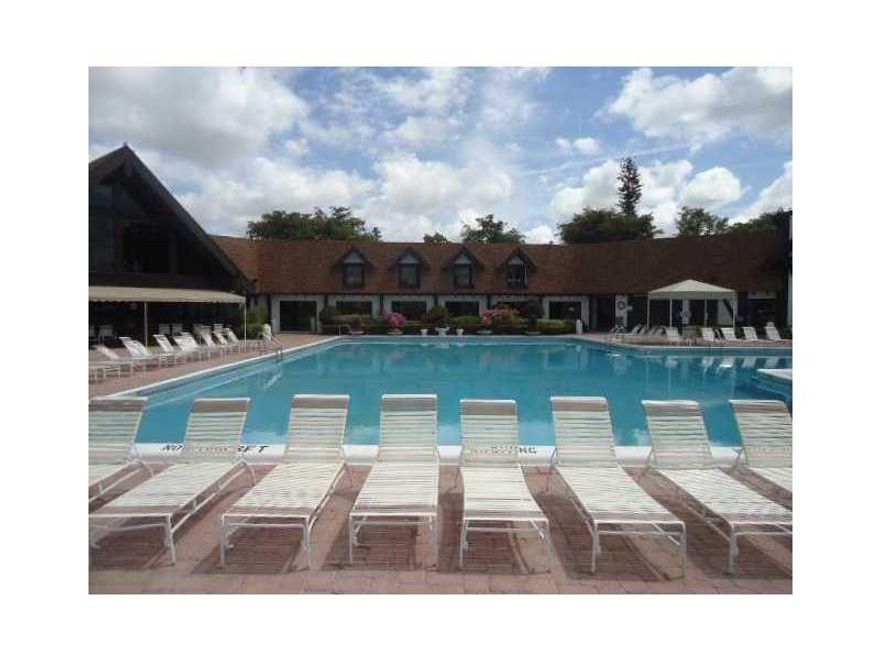 Amazing waterfront unit overlooking the canal and golf course! This beautifully residence features porcelain floors throughout, stainless steel appliances, and a split floor plan that provides comfort and privacy.
Located in the highly desirable International Village, this community offers true resort-style living : indoor and outdoor pools, spa, sauna, jacuzzi, tennis courts, gym, business center, piano and card room, and more. The grounds are exceptionally maintained with manicured gardens, colorful flowers, fountains, lakes, and peaceful walking areas. Gated community. 24 hours security Credit score 675.

Surrounded by water and lush landscaping, this unique community provides a lifestyle unlike any other.