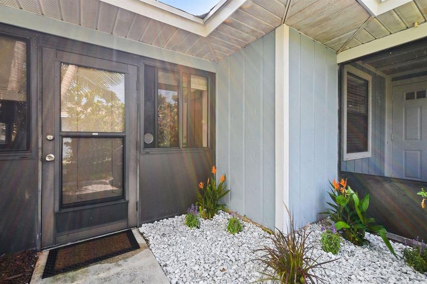 MOVE IN READY Updated 2 bed / 2 bath Villa close to downtown Jensen Beach, short distance to beaches & shopping.  As soon as you walk thru front door into spacious family room you will feel at home in this villa. Freshly painted, knock down ceilings, crown molding, 5 ¼ base boards, new rectangle porcelain tiles are just a few of the recent updates.  New Kitchen white cabinets, with granite counter tops, newer Black Stainless-Steel Appliances, and high-hat lighting plus a skylight that makes the kitchen bright and inviting.  Spacious functional Florida room with portable air conditioner provides extra space for a home office.  Split Bedrooms and bathrooms have new vanities with marble tops. This Villa is conveniently located in the front of the complex and has 2 parking spaces at the door! Low monthly HOA $175 per month and Pet friendly up to 3 pets. This is a must see!!