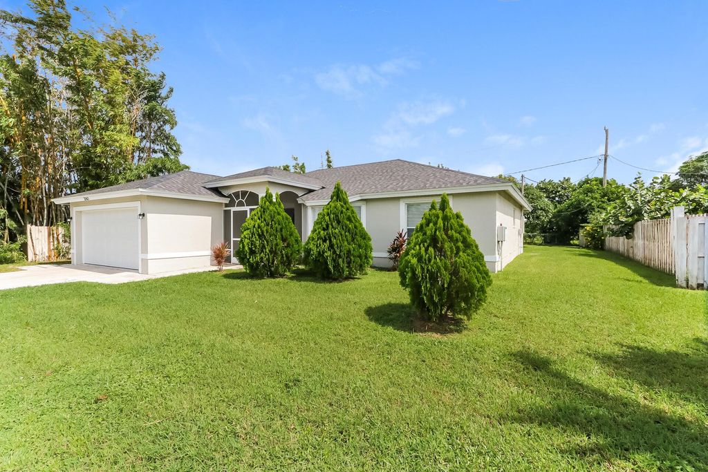 Photo of 2165 SW Monterrey Lane, Port Saint Lucie, FL 34953 (MLS # R11025623)