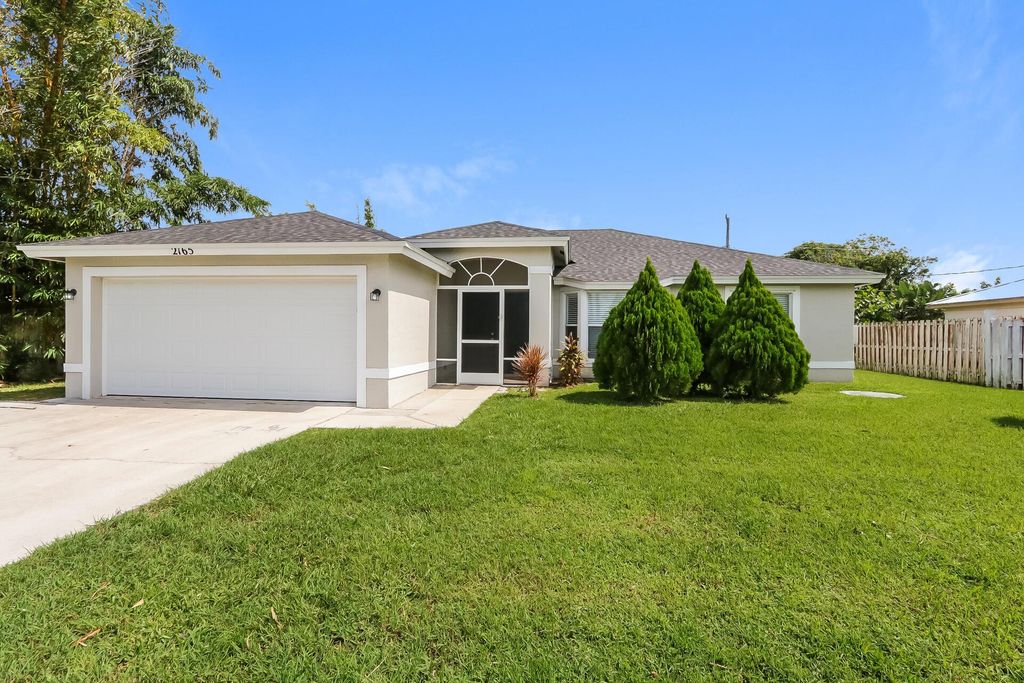 Photo of 2165 SW Monterrey Lane, Port Saint Lucie, FL 34953 (MLS # R11025623)
