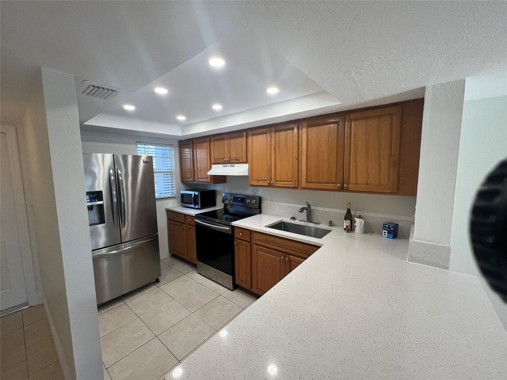 Photo of 3881 Crystal Lake Drive #5, Deerfield Beach, FL 33064 (MLS # F10488325)