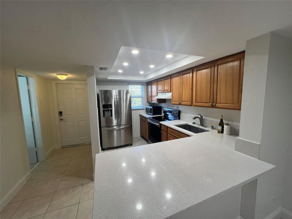 Photo of 3881 Crystal Lake Drive #5, Deerfield Beach, FL 33064 (MLS # F10488325)