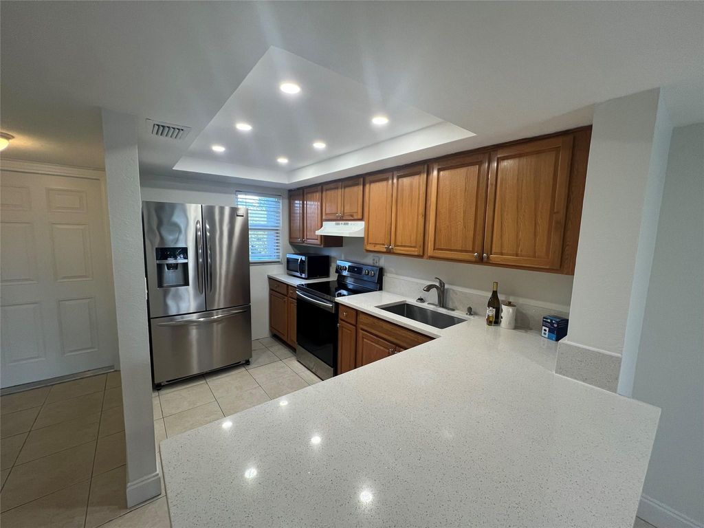 Photo of 3881 Crystal Lake Drive #5, Deerfield Beach, FL 33064 (MLS # F10488325)