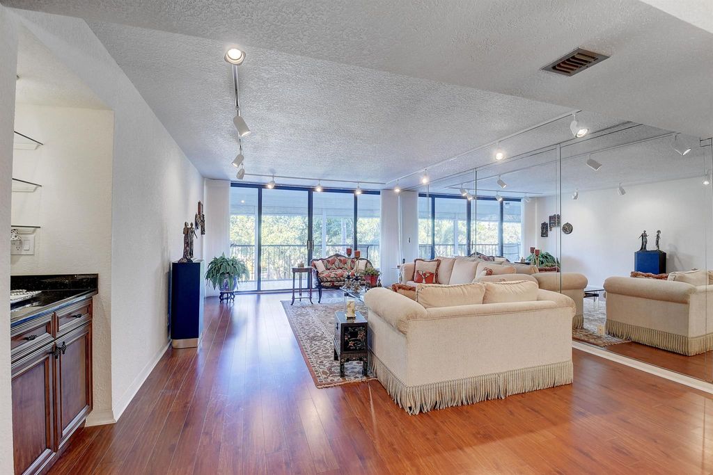 Photo of 20100 Boca West Drive #142, Boca Raton, FL 33434 (MLS # R10934516)