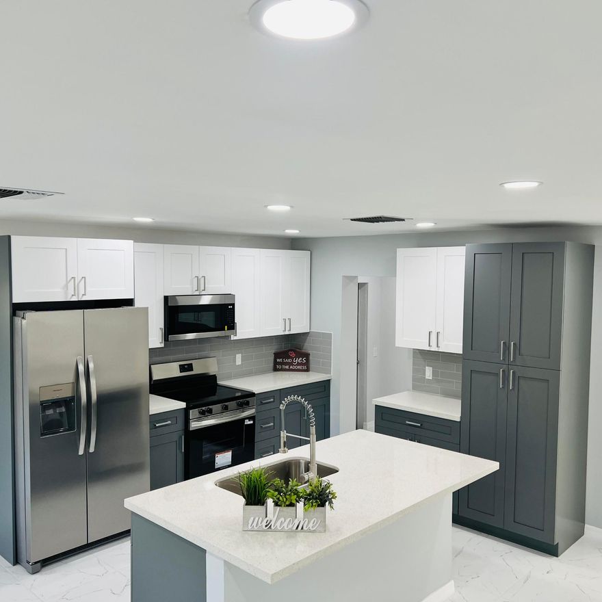 Get ready to fall in love! This beautifully remodeled 3 bed, 2 bath home delivers style, comfort, and Florida living at its best. You'll feel the care and quality poured into every detail the moment you walk in!

Enjoy an extra large fenced yard with several shady trees, a storage shed, and room for a pool. This home shines with tile throughout and a fresh, modern finish that feels brand new. Bay windows give lots of natural light and breeze.

Relax on your screened patio, and enjoy the quiet neighborhood while being just minutes from the shopping, dining, and entertainment of St. Lucie West.

This home is the perfect blend of beauty and comfort. Schedule a tout today!