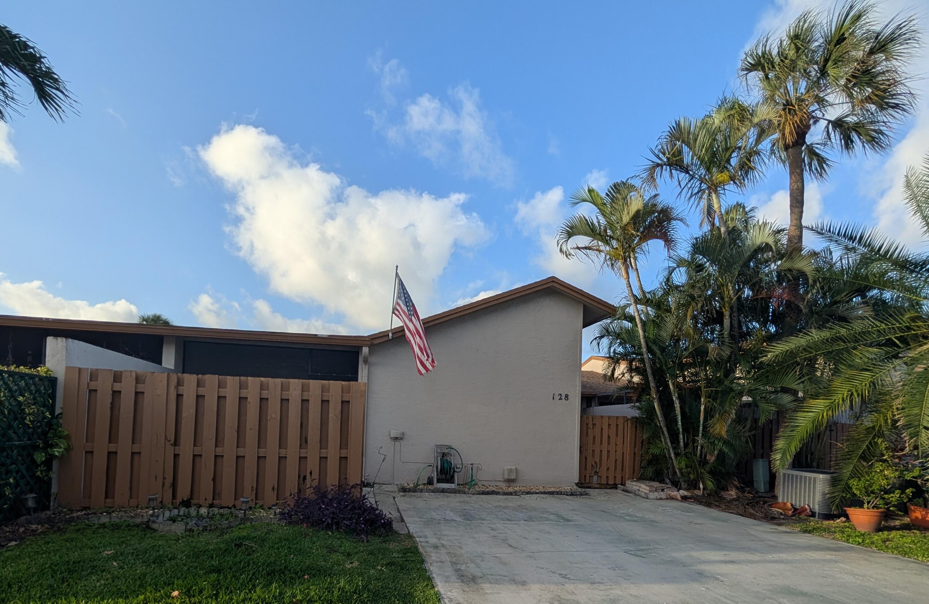 Great private street Villa with comfortable sized rooms with large dinning / living rooms area, vaulted ceiling, kitchen, laundry room inside, large master bedroom with very spacious walking closet, bathroom with tub. Second bedroom spacious with bathroom. Open patio area for barbecue, screened porch at entrance. 2 cars driveway at the door. Pool s just crossing the street. Close to shops, entertainment