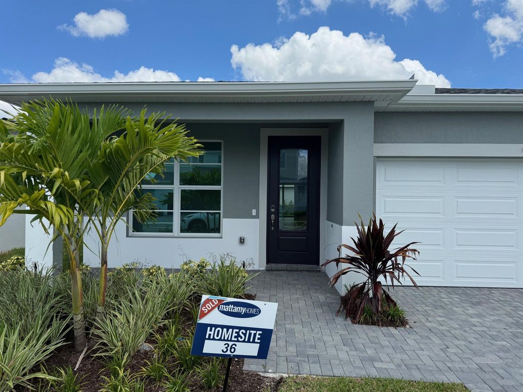 Photo of 9555 SW Indra Way, Port Saint Lucie, FL 34987 (MLS # R11117611)