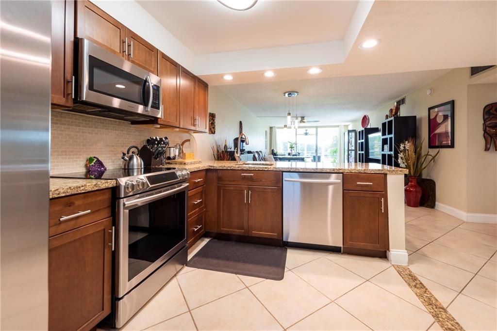 Photo of 806 Cypress Blvd #305, Pompano Beach, FL 33069 (MLS # F10300201)