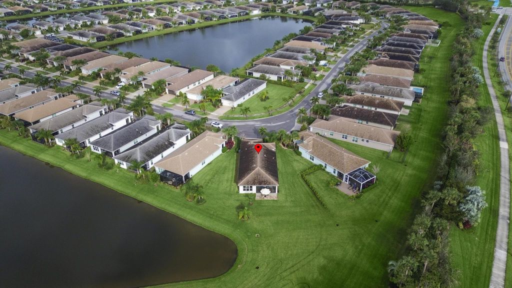 Photo of 10601 SW Sunray Street, Port Saint Lucie, FL 34987 (MLS # R10955079)