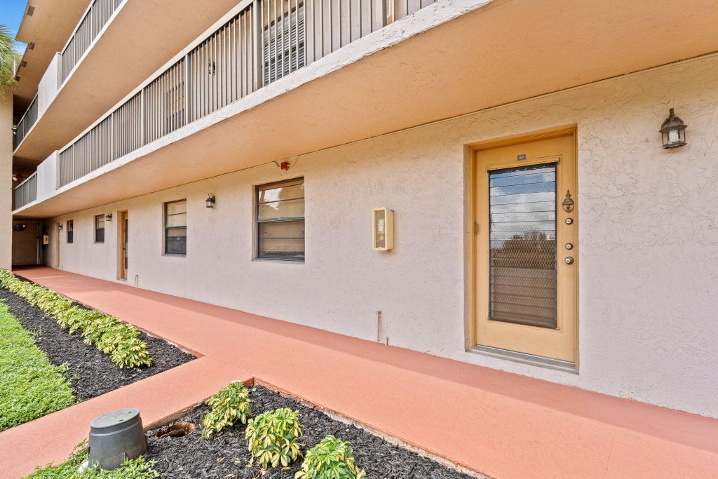 Photo of 6085 N SABAL PALM Boulevard #107, Tamarac, FL 33319 (MLS # B26088417)