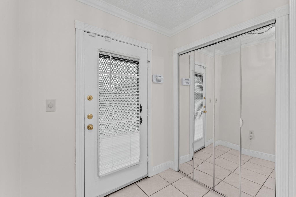 Photo of 6085 N SABAL PALM Boulevard #107, Tamarac, FL 33319 (MLS # B26088417)