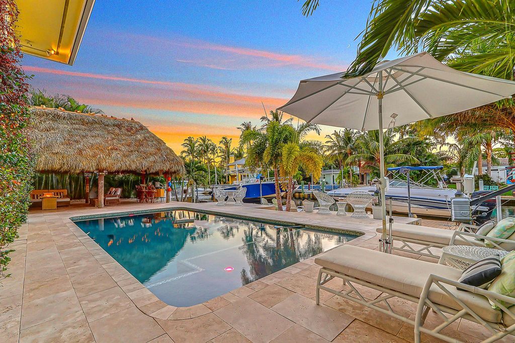 Photo of 926 Dolphin Drive, Jupiter, FL 33458 (MLS # R11030805)