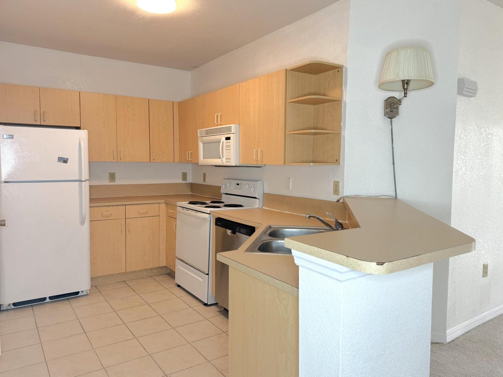 Photo of 166 SW Peacock Boulevard #34-204, Port Saint Lucie, FL 34986 (MLS # R11029631)