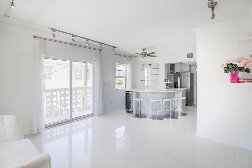Located in the heart of Miami Beach's Flamingo Lummus neighborhood, this modernized updated 1-bedroom, 1-bathroom corner unit offers bright, open living just blocks from the beach. Multiple exposures fill the space with natural light, and the layout feels airy and spacious.
Features include assigned covered garage parking, hurricane impact windows and doors, elevator access, a private balcony, central A/C, in-unit washer, and a bar area. Pet-friendly building.
Set on a quiet residential street, yet just steps from Flamingo Park with tennis courts, pool, track, and fitness amenities. Minutes to Lincoln Road, Española Way, and South Beach dining and shopping. Perfect as a primary residence, vacation home, or investment in one of Miami Beach's most highly desirable neighborhoods.