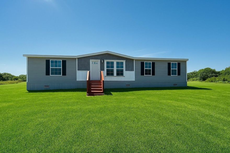 Brand New 3BR/2BA | 1.25 Acres | Prairie/Viking Community Move-in ready and beautifully upgraded with an oversized 20x8 deck, this 1,493 SqFt Champion Embrace home offers a modern split floor plan with warm wood tones, accent walls, and contemporary interior design throughout. The spacious kitchen features a coffee bar, built-in microwave, pantry cabinet, large island with pendant lighting, and contrasting countertops. A separate dining area flows into the inviting living room, while the interior laundry room includes built-in cabinets and a hanging rack for added convenience. The private primary suite is designed for comfort, offering a standalone soaking tub, oversized walk-in shower, double vanity, and tall linen cabinet.