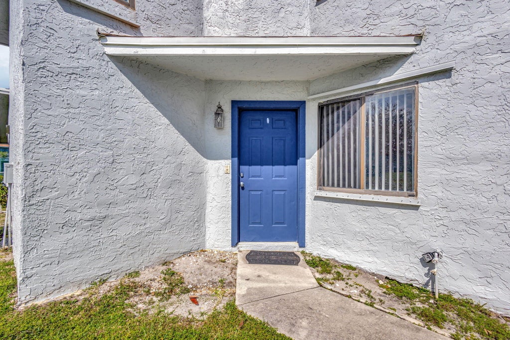 Photo of 1571 Woodbridge Lakes Circle, West Palm Beach, FL 33406 (MLS # R11032951)