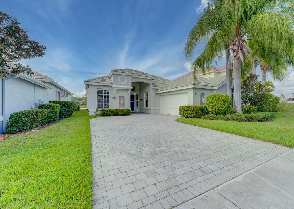 Photo of 614 SW Lake Charles Circle, Port Saint Lucie, FL 34986 (MLS # R10941073)
