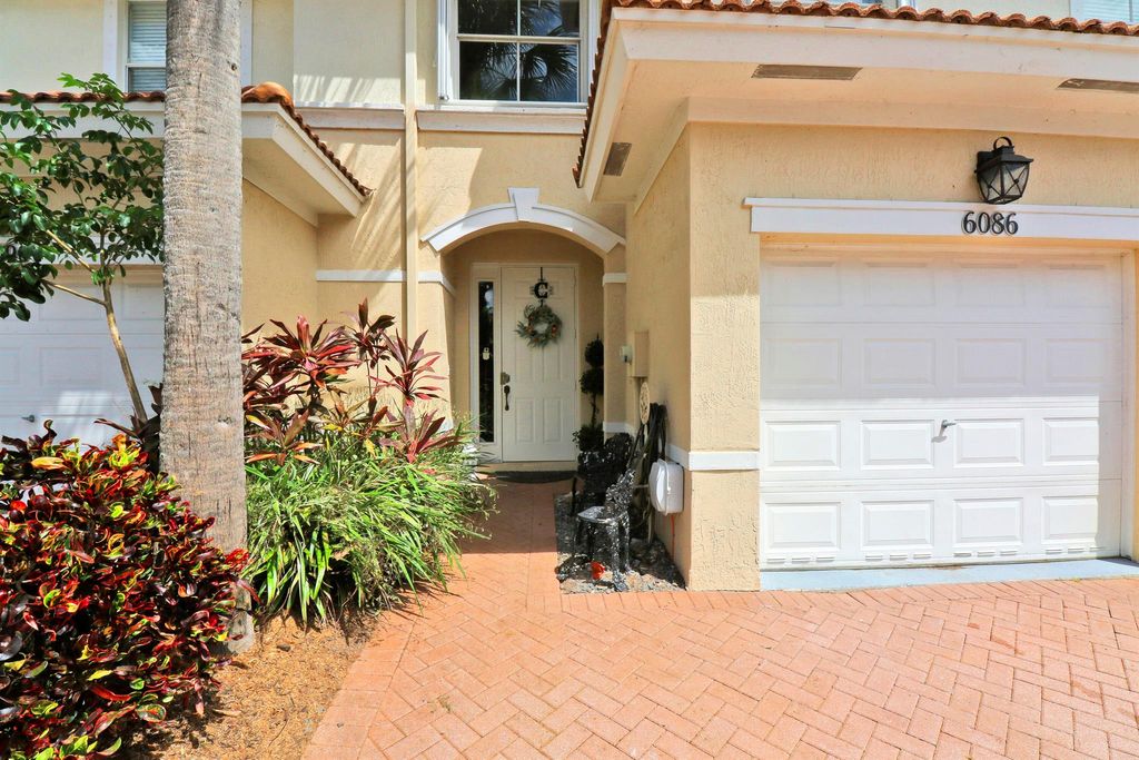 Photo of 6086 Seminole Gardens Circle, Riviera Beach, FL 33418 (MLS # R10918670)