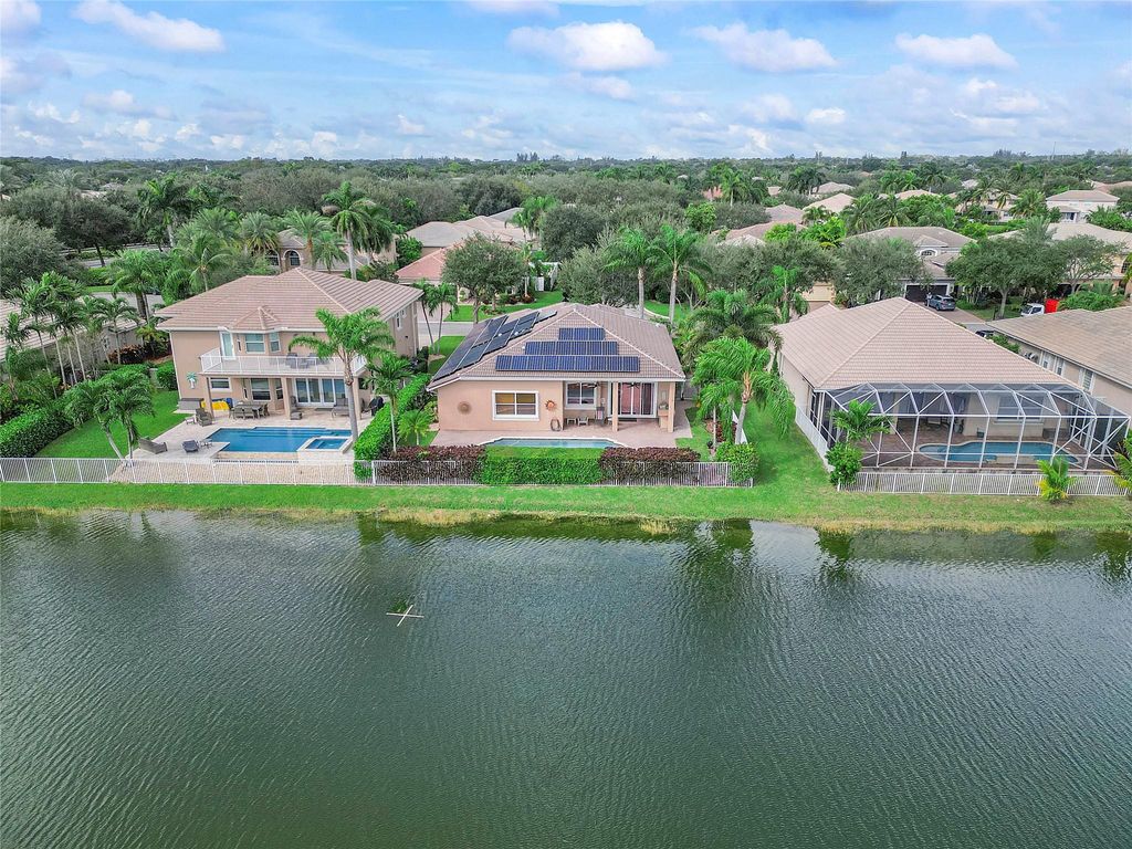 Photo of 5840 NW 54th Circle, Coral Springs, FL 33067 (MLS # F10512664)