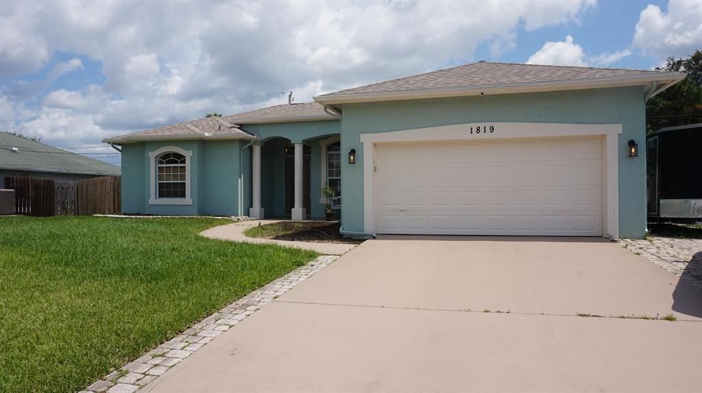Photo of 1819 SW Renfro Street, Port Saint Lucie, FL 34953 (MLS # R10743158)