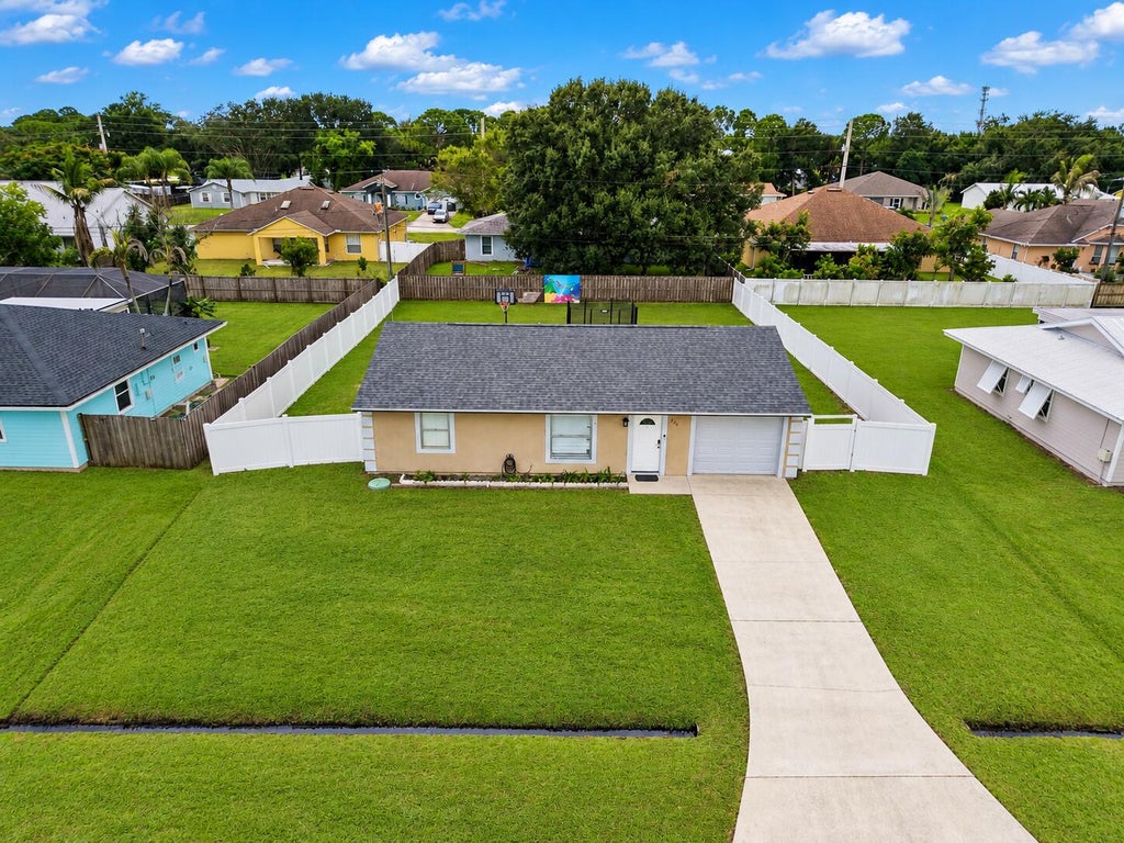 Photo of 420 SW Parish Terrace, Port Saint Lucie, FL 34984 (MLS # B26078992)