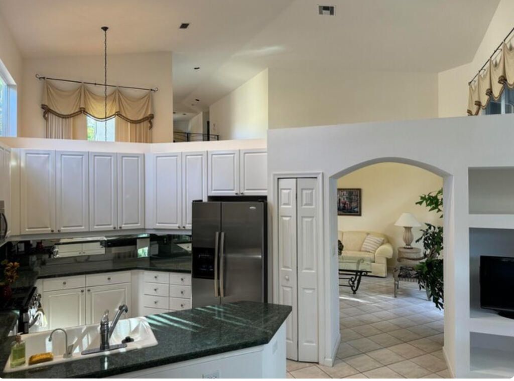 Photo of 324 Sunset Bay Lane, Palm Beach Gardens, FL 33418 (MLS # R10973701)