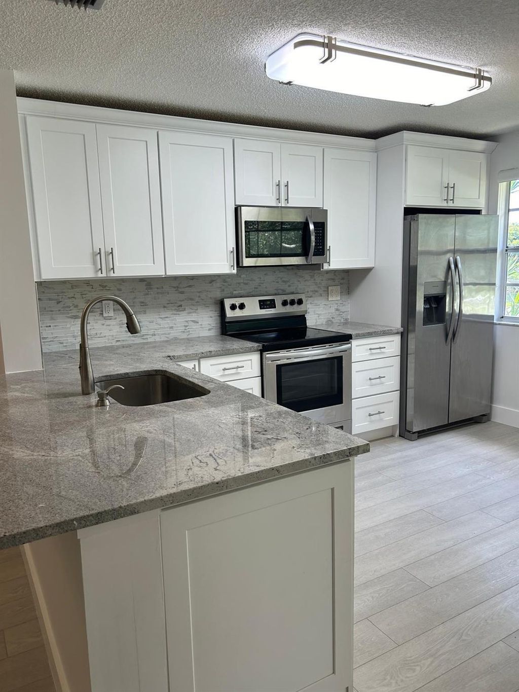 Photo of 6528 Via Regina, Boca Raton, FL 33433 (MLS # R11088577)