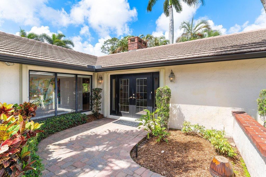 Photo of 477 Glenbrook Drive, Atlantis, FL 33462 (MLS # R11077947)