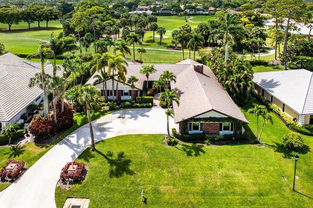 Photo of 477 Glenbrook Drive, Atlantis, FL 33462 (MLS # R11077947)