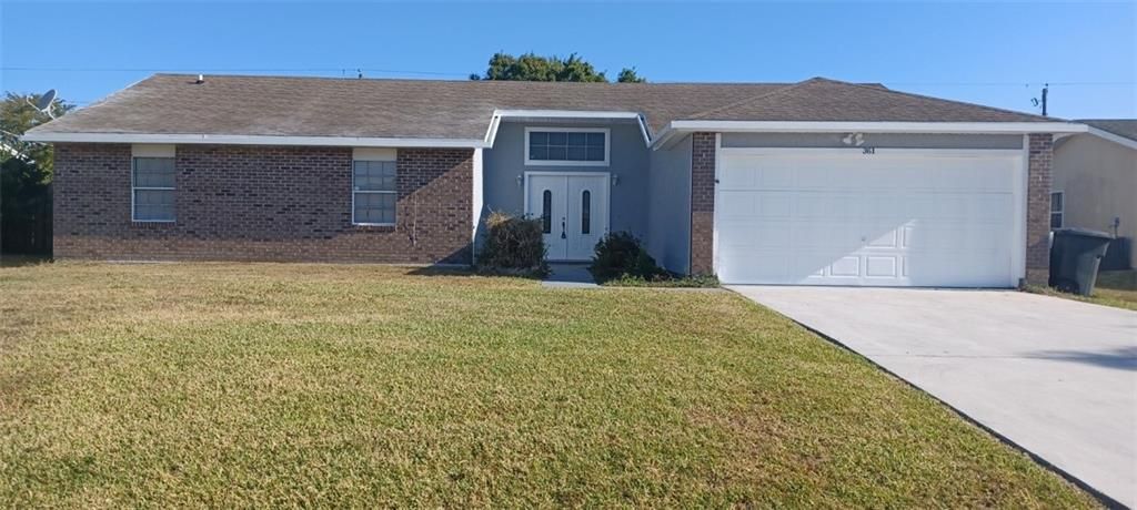 Photo of 361 NW Tyler Ave, Port St Lucie, FL 34983 (MLS # F10372392)