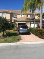 Sought after community! Spectacular views from this impeccable lakefront townhouse with new porcelain wood grain tile flooring, granite counter tops, bright white kitchen with pass through bar to family room. Beautiful screened patio over looking the lake. Freshly painted and in move in/model condition. Two sinks in the master bath and large walk in closets in both bedrooms. All this with a one car garage! Just steps to the end of the cul de sac with a beautiful nature preserve. No rear neighbors, close proximity to pool and community amenities. Gated community in A rated school district. This one won't last! Minimum credit score of 650 and clean background required.