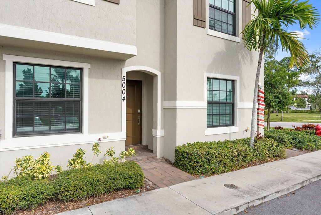 Photo of 5004 Genove Place, Riviera Beach, FL 33410 (MLS # R10944249)