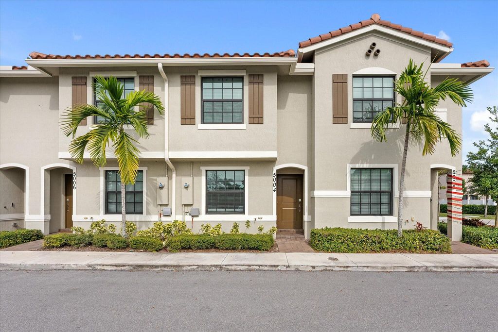 Photo of 5004 Genove Place, Riviera Beach, FL 33410 (MLS # R10944249)