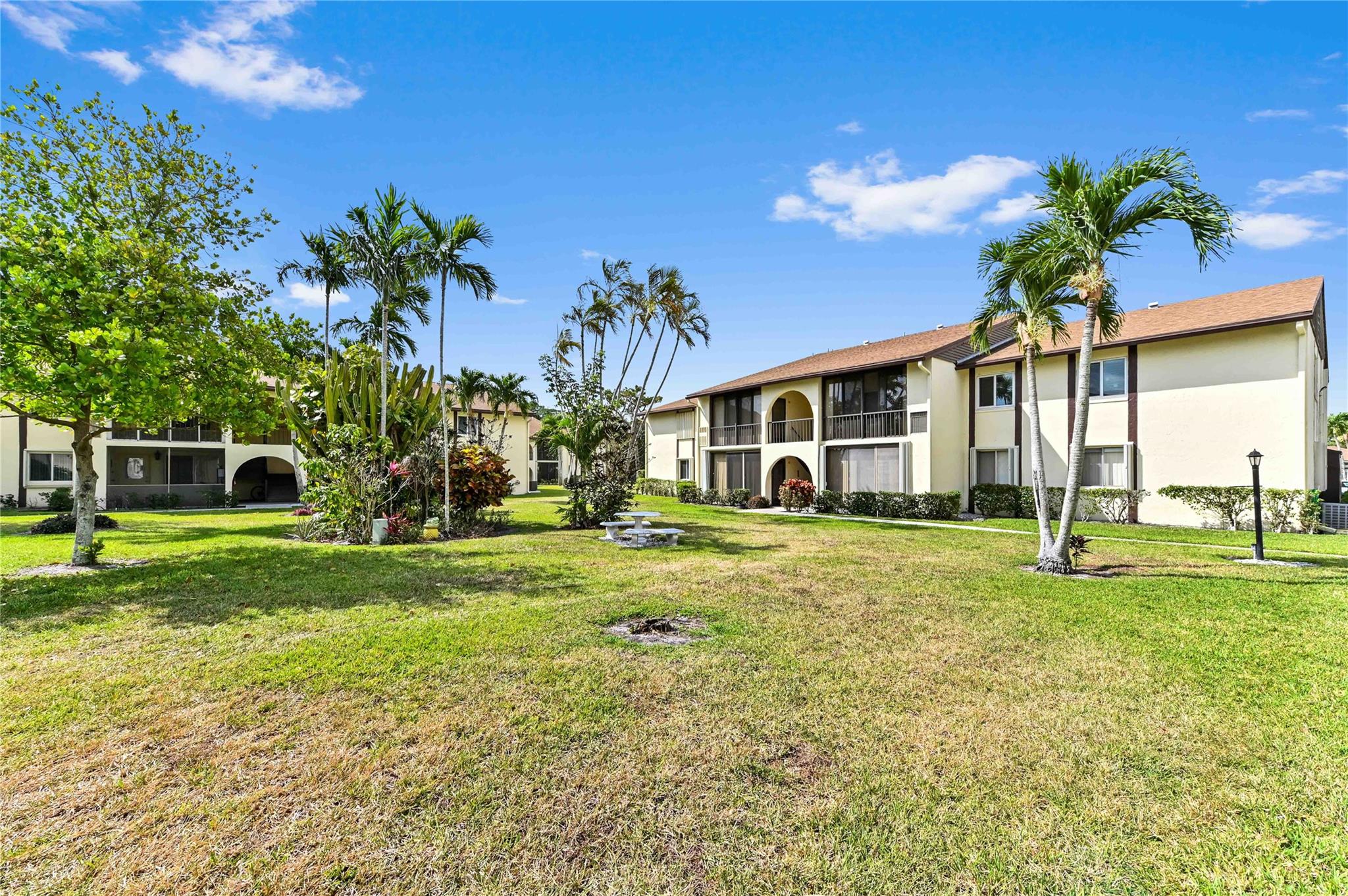 Welcome to Pine Ridge IV. Excellent opportunity to own this 2 bedroom 1 bath condo for year round or snowbird living!! This fully applianced unit is light and bright with a great floridian feel, spacious floor plan and lots of closet space!! Enjoy early mornings and relaxing evenings from the comfort of your private screened porch overlooking the grounds! Community amenities include the pool, community center and shuffle board. Easy commuting to Palm Beach airport. No leasing for 2 years.