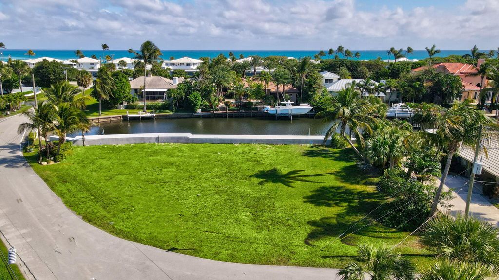 Photo of 25 Sabal Island Drive, Ocean Ridge, FL 33435 (MLS # R11159543)