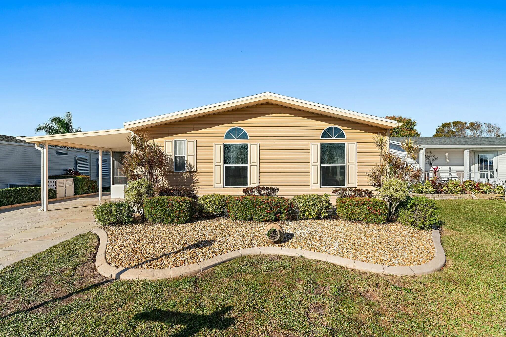 Land Owned-Welcome to this charming lakeside 2-bedroom, 2-bath home in the highly sought-after Savanna Club 55+ community! This fully furnished, turn-key home features 2 enclosed porches, perfect for relaxing while enjoying stunning lake views. Recent updates laminate floors, granite kitchen, decor drive, 2021 roof, 2020 AC, and 2013 water heater, and plumbing ensuring peace of mind. Located in an amenity-packed community with access to golf, pools, and fitness centers, you're also just minutes away from pristine beaches, restaurants, shopping, medical facilities, and entertainment. This is the ideal spot to retire in comfort and style!