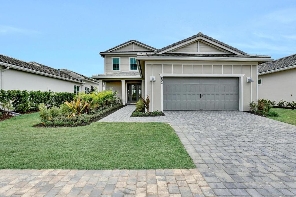 Photo of 203 SE Calmo Circle, Port Saint Lucie, FL 34984 (MLS # R11154612)