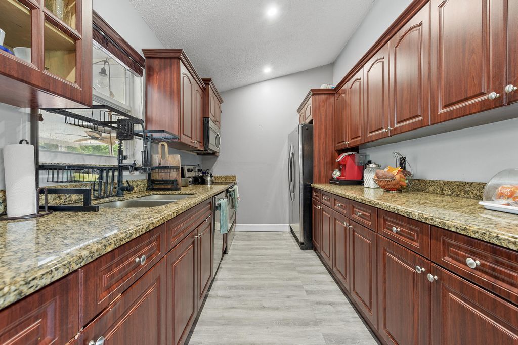 Photo of 13254 79th Court N, West Palm Beach, FL 33412 (MLS # B26022340)