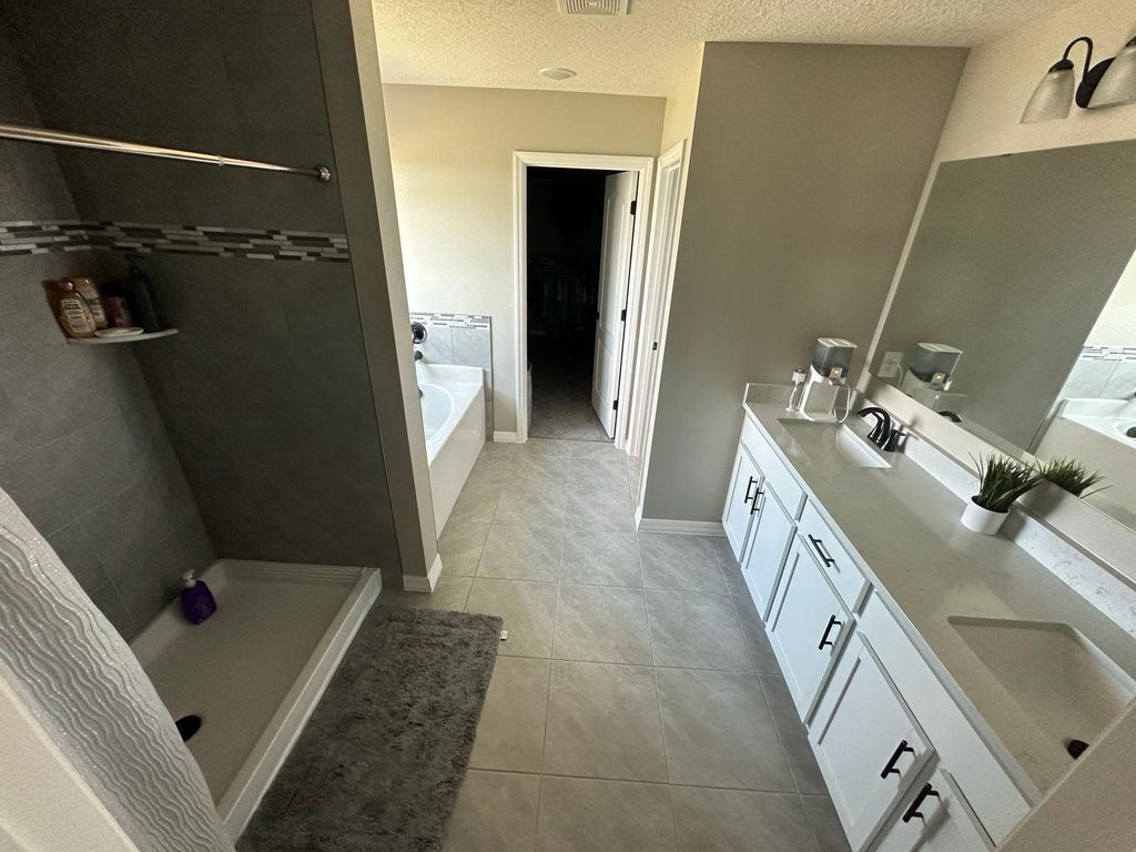 Photo of 10638 SW Vasari Way, Port Saint Lucie, FL 34987 (MLS # B26040072)