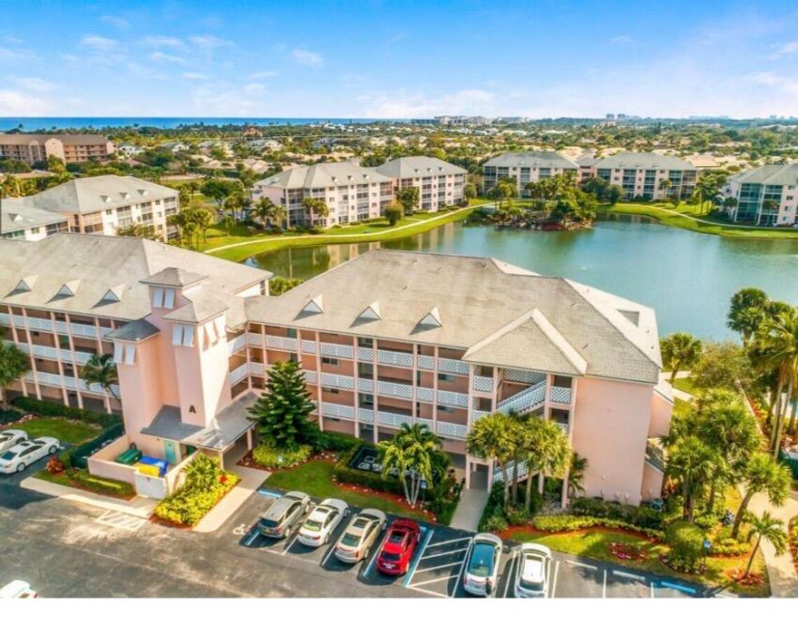 2 bedroom, 2 bath condo on second floor (elevator) with beautiful lake views, tastefully decorated, tile floors throughout, open newer kitchen with quartz countertops, stainless steel appliances, washer/dryer, new hall bath, great location which is close to pool and right next door to Twisted Tuna restaurant in community, close to shops in Harbourside and beach, king size bed in master bedroom and two beds in guest room. All utilities included in rent with cap of $50 electric monthly.  Available 5/1/2026 - 10/31/2026 only.