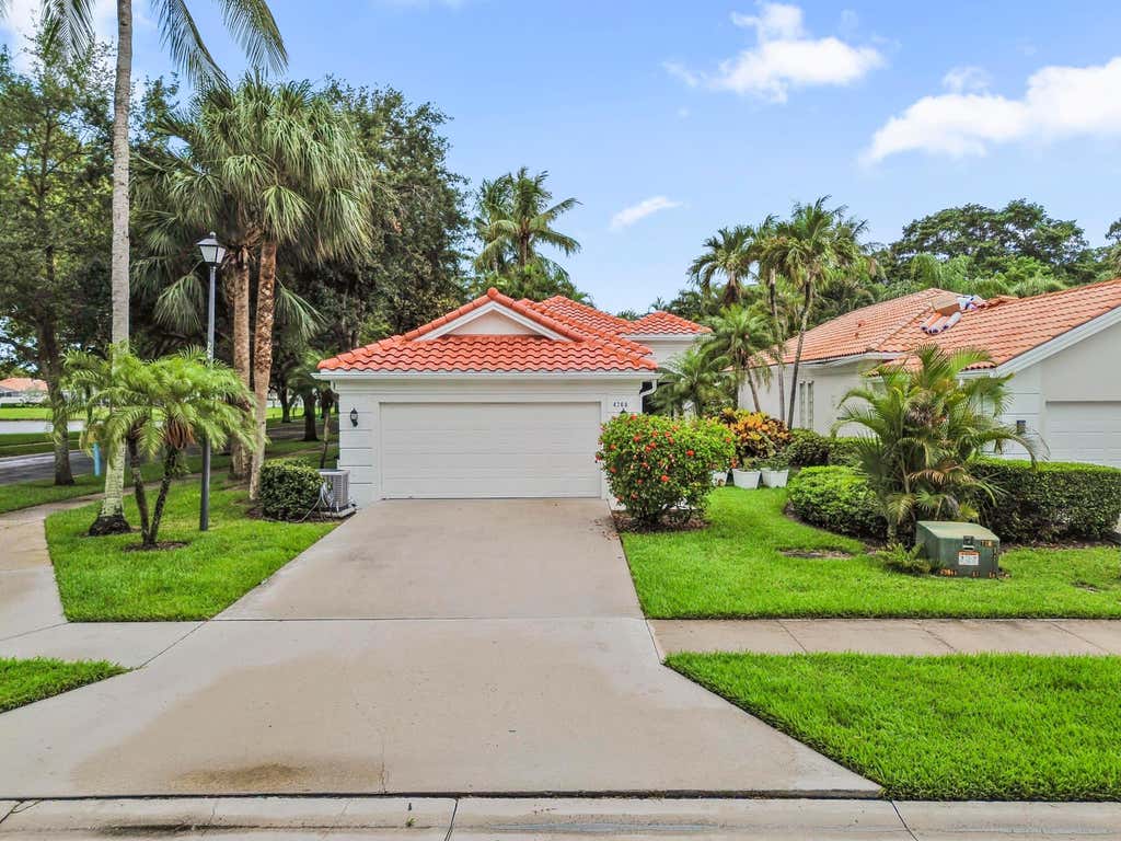Photo of 4766 Valencia Drive, Delray Beach, FL 33445 (MLS # B26037157)